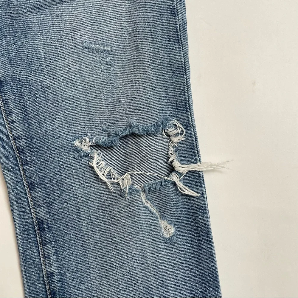 LEVI’S 511 distressed jeans